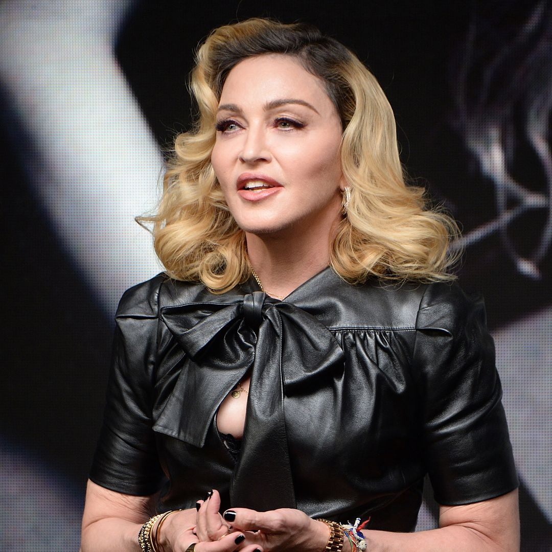 Madonna's son David Banda towers over her in glamorous vacation photos also featuring daughters