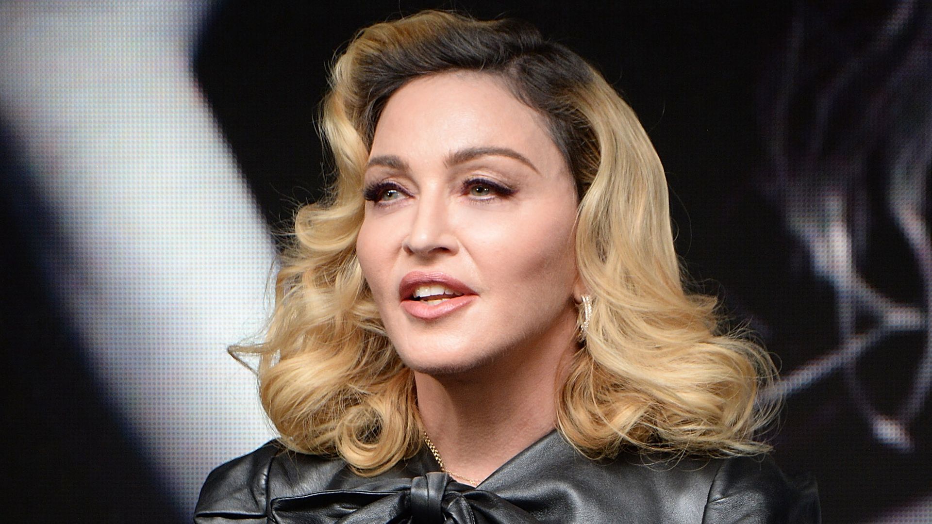 Madonna's son David Banda towers over her in glamorous vacation photos also featuring daughters