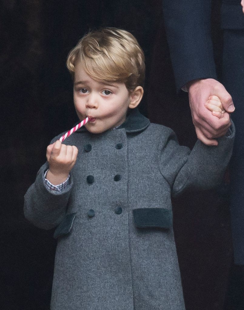 Prince George eating a candy cane