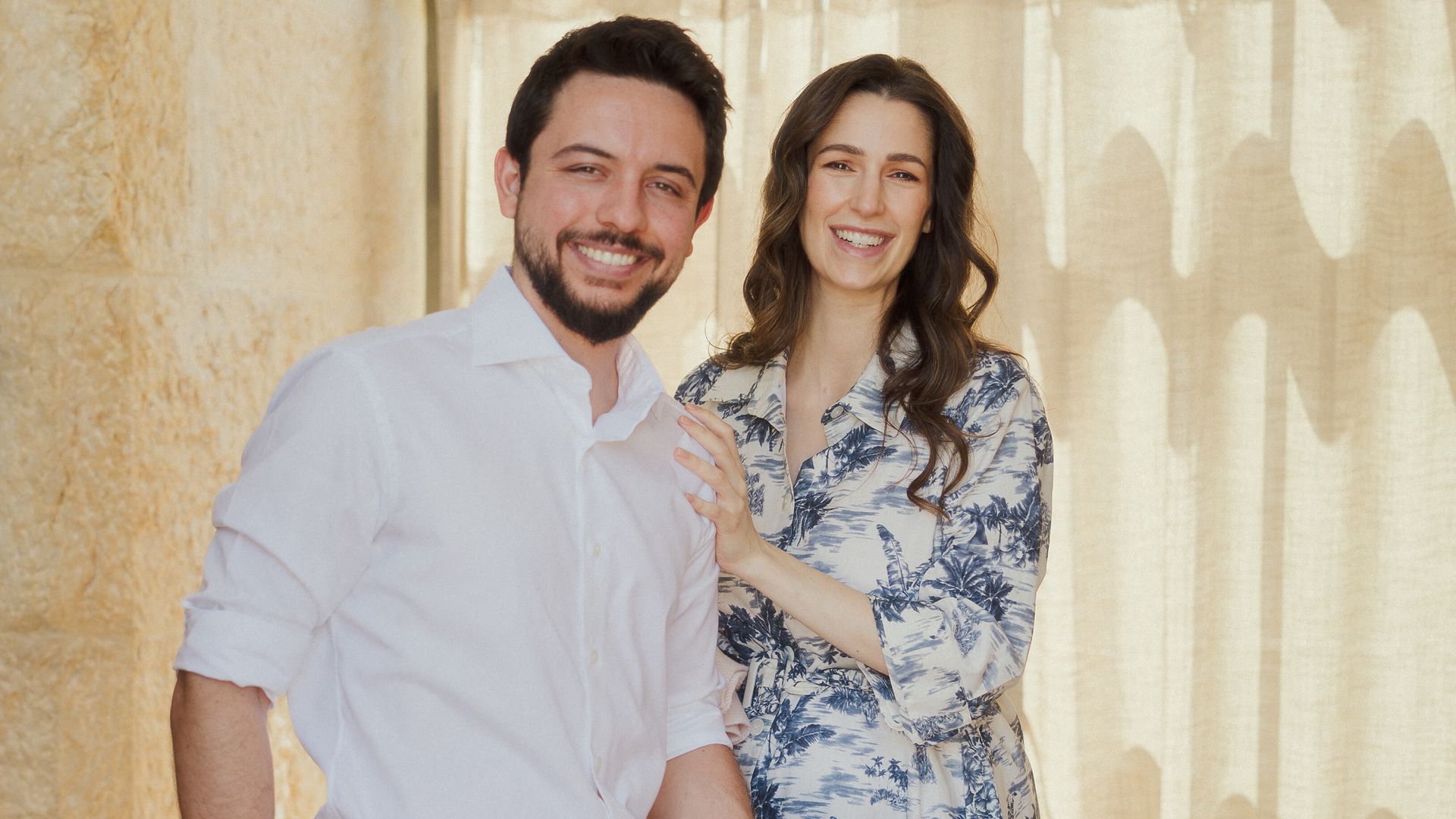 Jordan's Crown Prince Hussein (or Al Hussain), holds his newborn daughter Princess Iman, with his wife, Princess Rajwa, as they leave the King Hussein Medical Centre hospital, in Amman, 