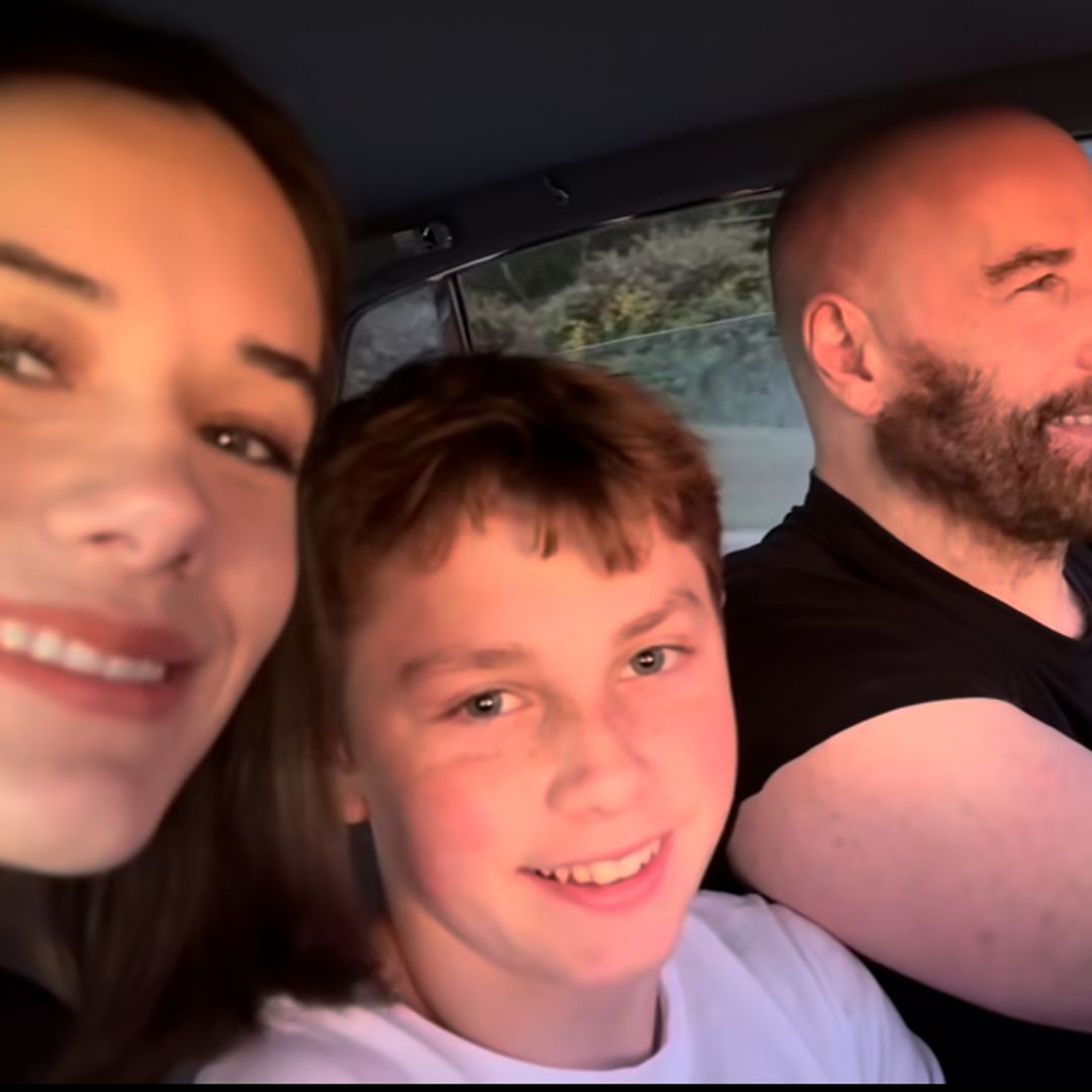 John Travolta celebrates the New Year in spectacular fashion with his two kids