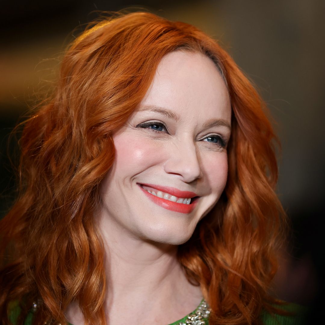 Christina Hendricks looks phenomenal in figure-hugging dress in loved-up photo with husband