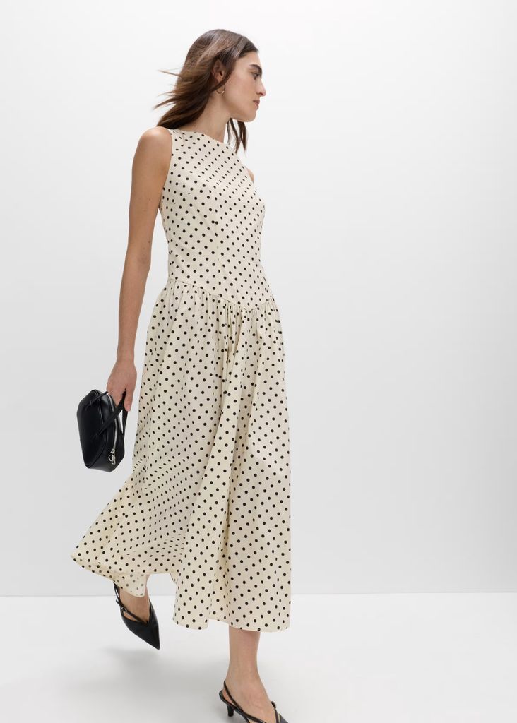 M&S styled the white dress with elegant kitten heels